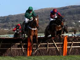 Peace And Co jumping the last with Karezak in the Triumph Hurdle Trial.